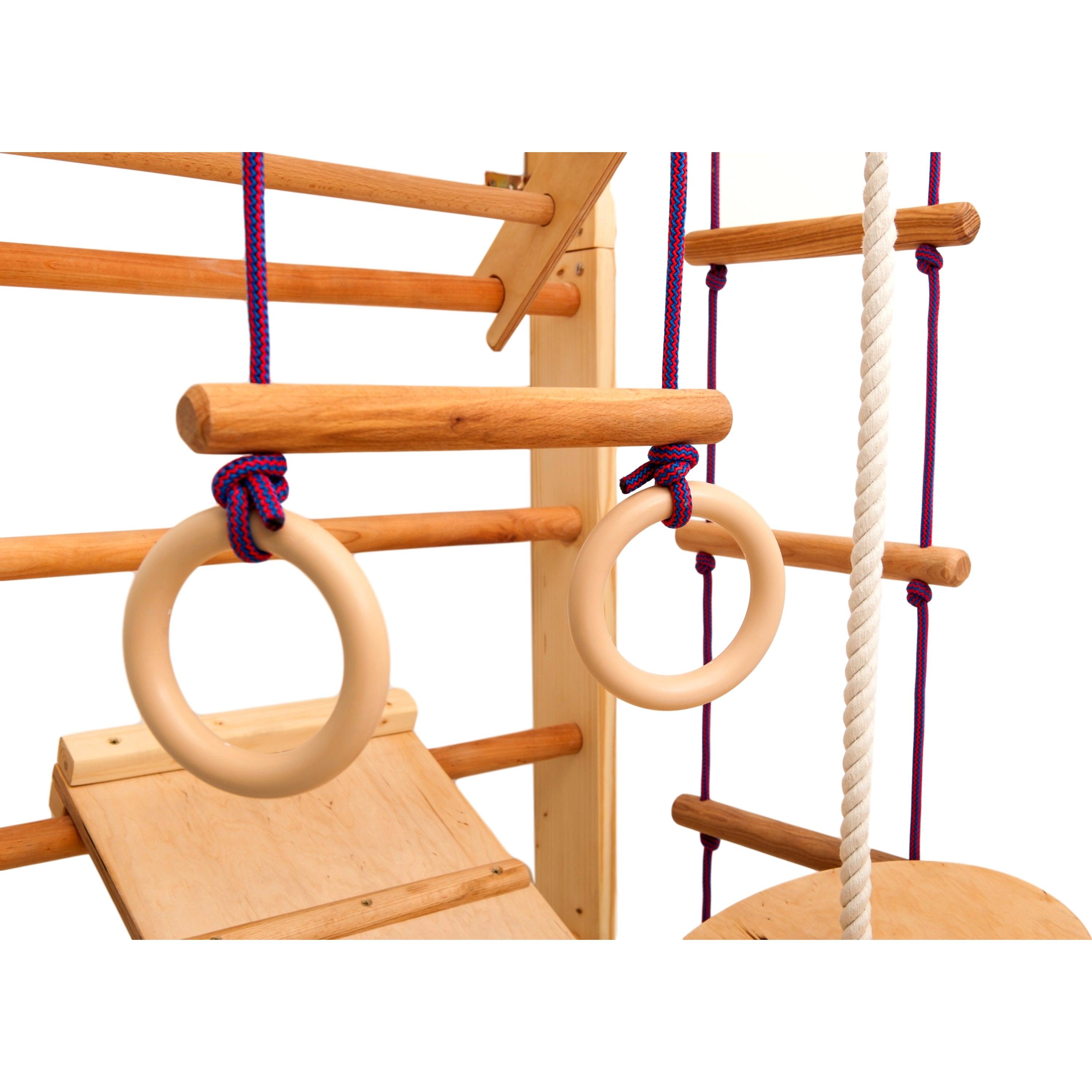 Kletterwand für Kinder - Indoor Klettergerüst aus Holz - Wand-Reck, Stange, Gymnastik-Ringe, Kletterseil, schwedische Leiter, Schaukel, Montagesatz. - RINAGYM GmbH