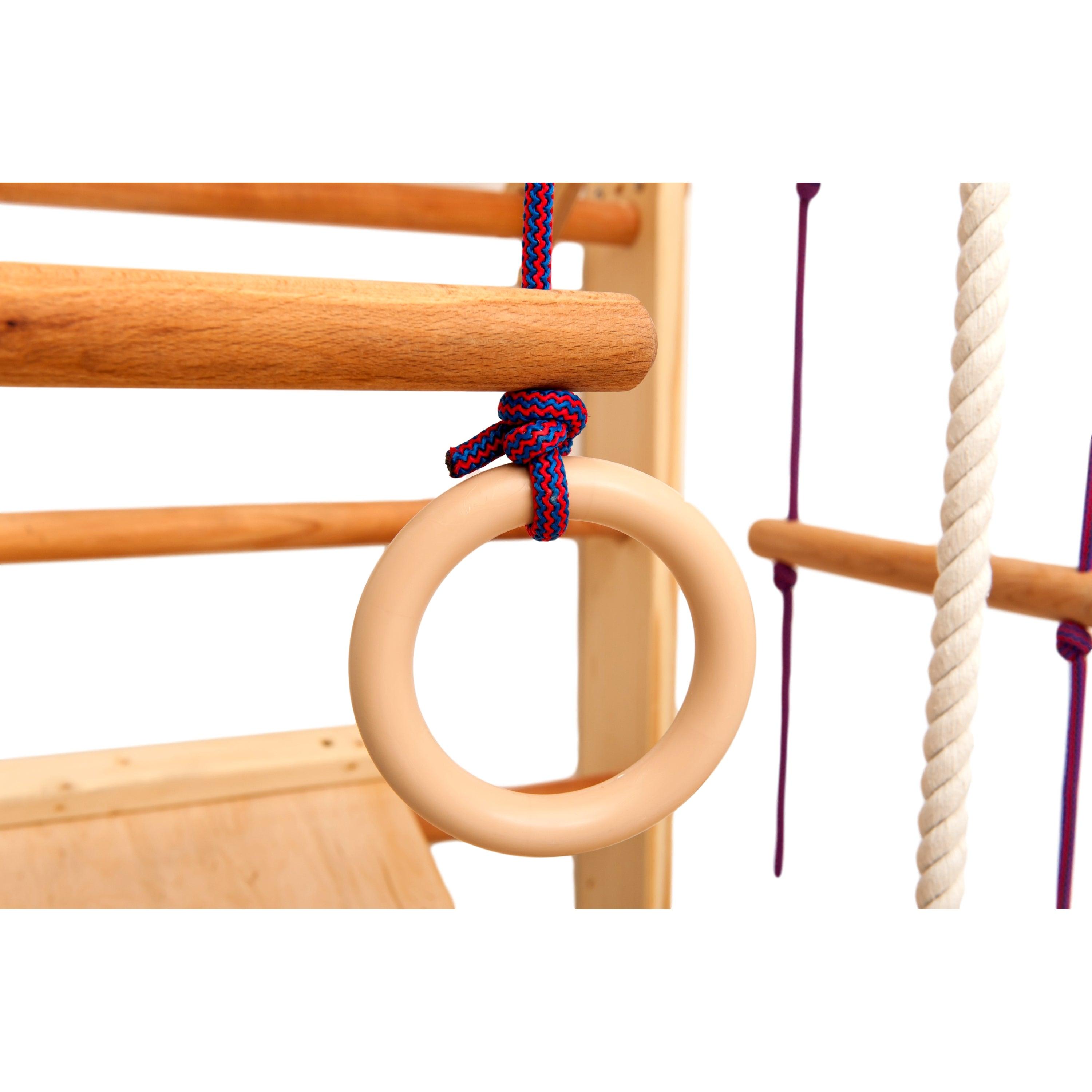 Kletterwand für Kinder - Indoor Klettergerüst aus Holz - Wand-Reck, Stange, Gymnastik-Ringe, Kletterseil, schwedische Leiter, Schaukel, Montagesatz. - RINAGYM GmbH