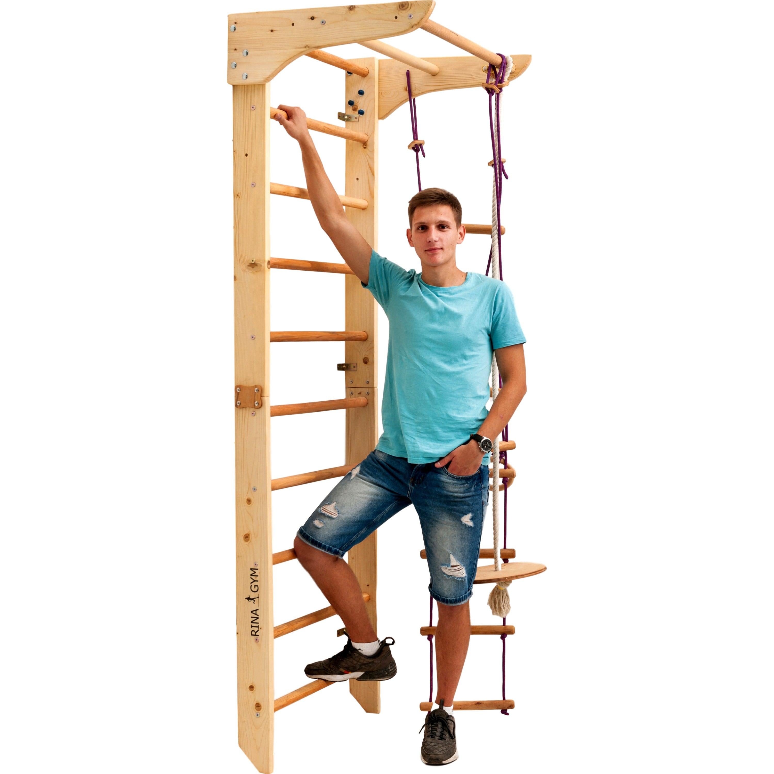 Kletterwand für Kinder - Indoor Klettergerüst aus Holz - Wand-Reck, Stange, Gymnastik-Ringe, Kletterseil, schwedische Leiter, Schaukel, Montagesatz. - RINAGYM GmbH